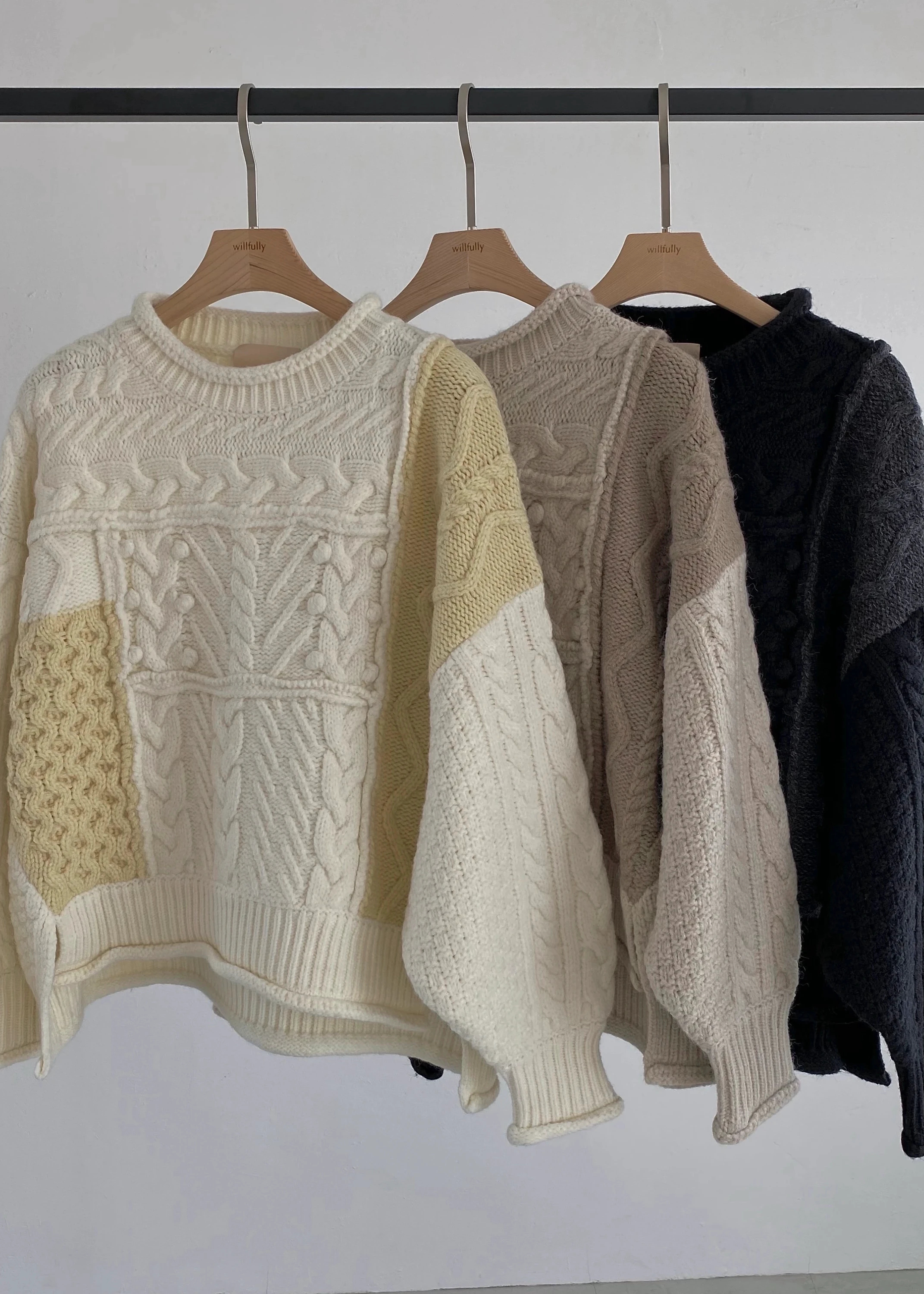two-tone patchwork cable knit