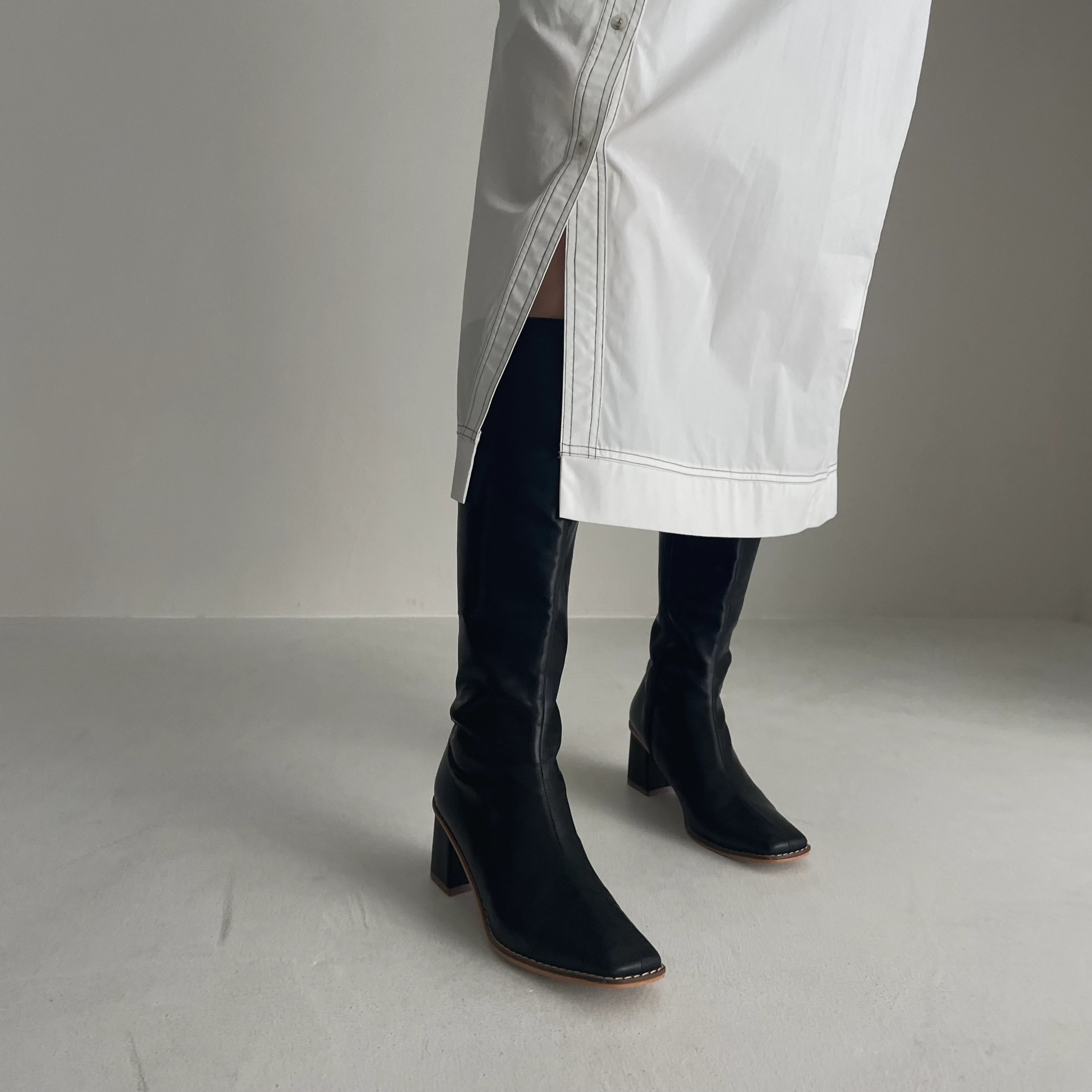 stitch sole trapezoid heel long boots