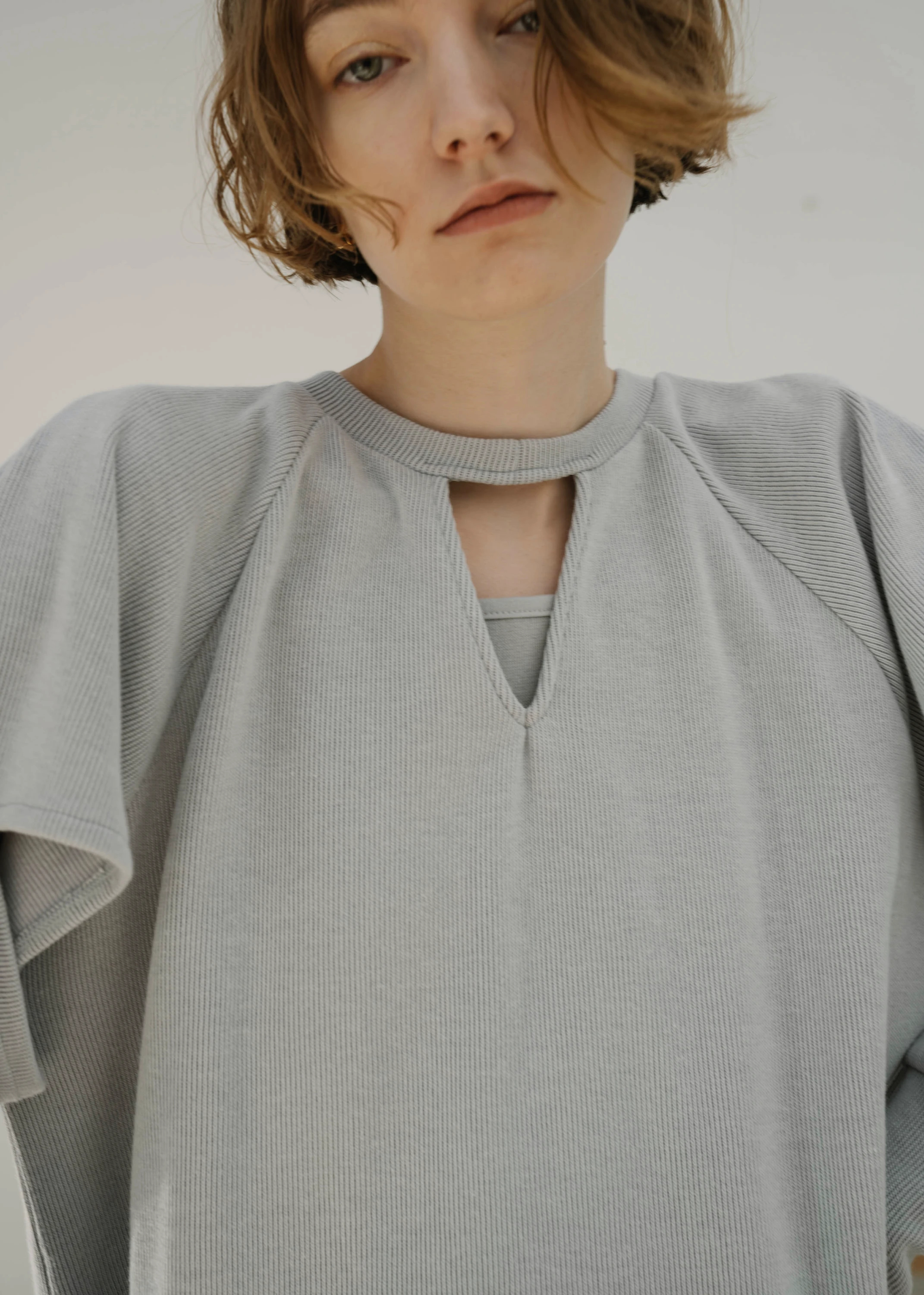 ring button thermal many way tops / willfully（ウィルフリー）の 